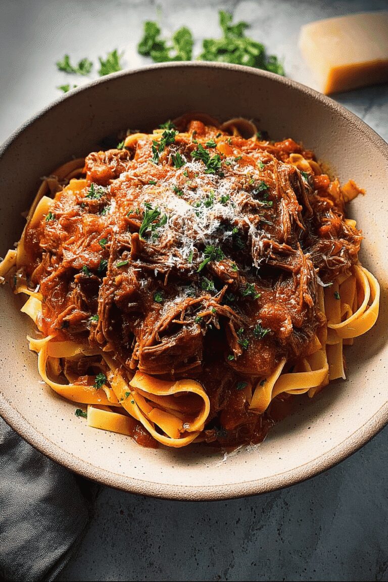 slow cooked shredded beef ragu pasta 2.png